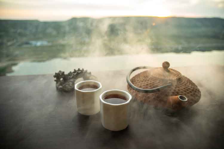 tea set with hot tea in the morning